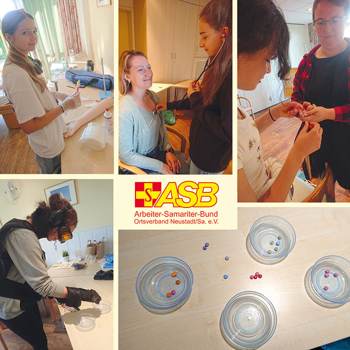 Schülerinnen und Schüler beim praktischen Einsatz an verschiedenen Stationen, Foto: ASB